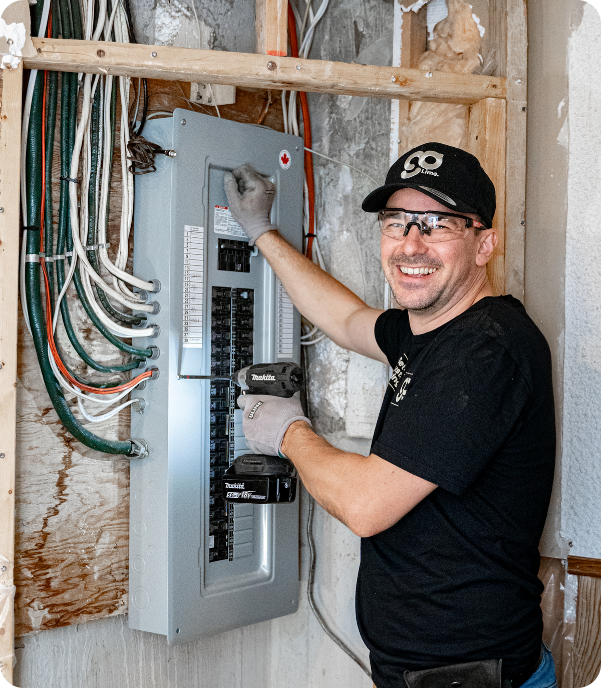 Electrician working on an electrical panel 
