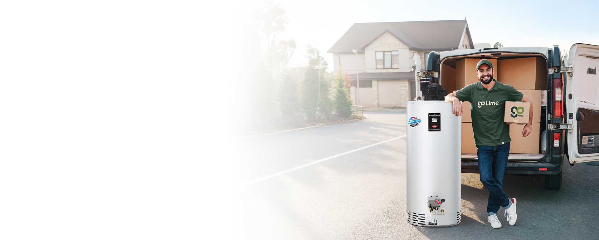 Man standing next to a water heater