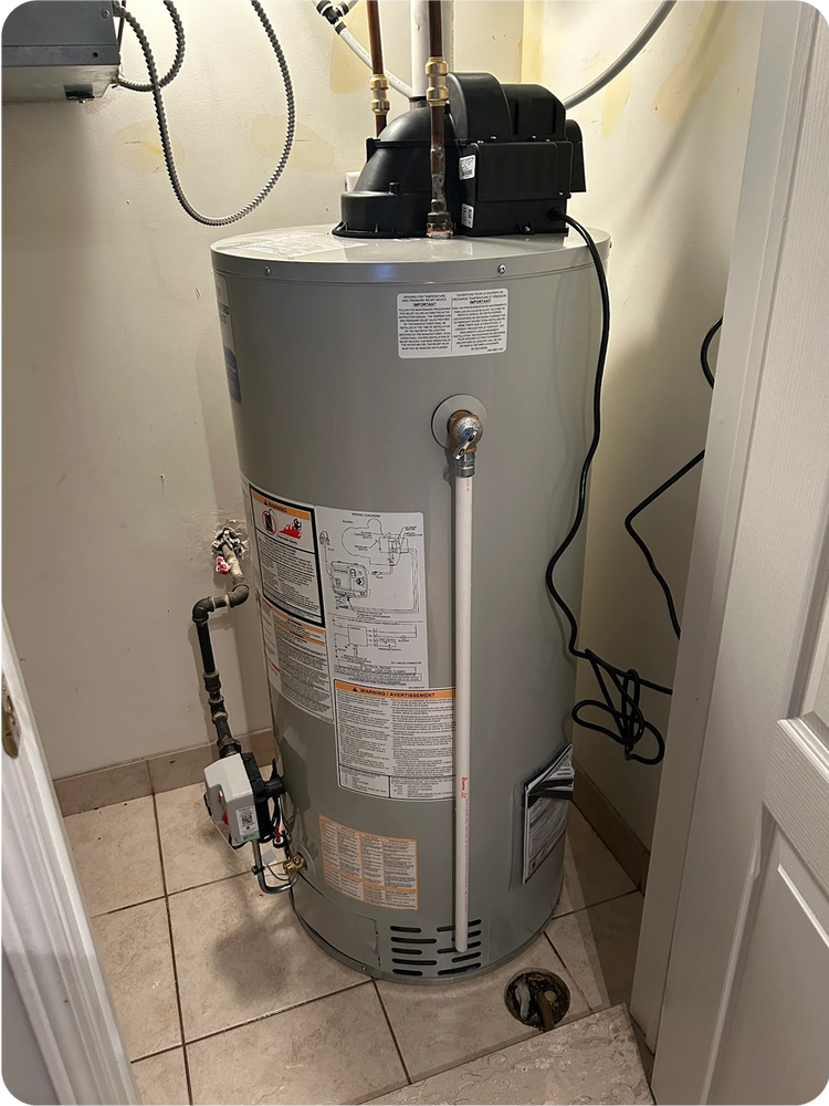 Gray water heater with visible labels